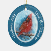 Kerstkardinale sneeuwvlokken op rood of blauw keramisch ornament (Links)