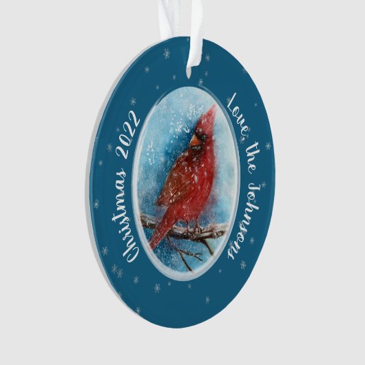 Kerstkardinale sneeuwvlokken op rood of blauw ornament (voorkant)