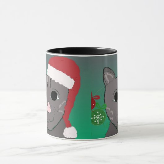 Kerstkat in een rode kersthat mok (Midden)