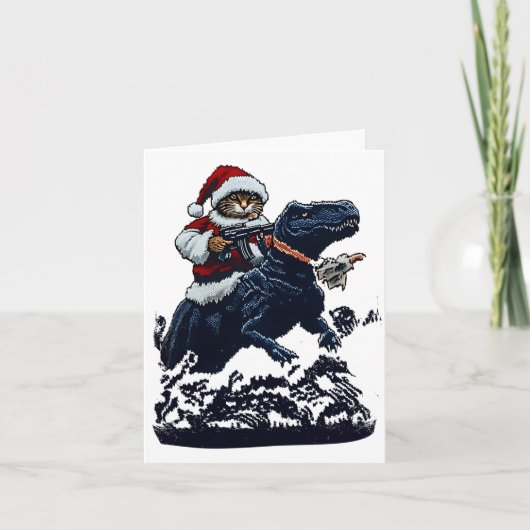 Kerstkat in kerstmuts met pistool en dinosaurus kaart (Voorkant)