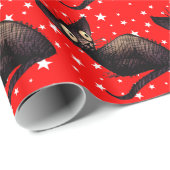 kerstkat op sterren cadeaupapier (Rol Hoek)