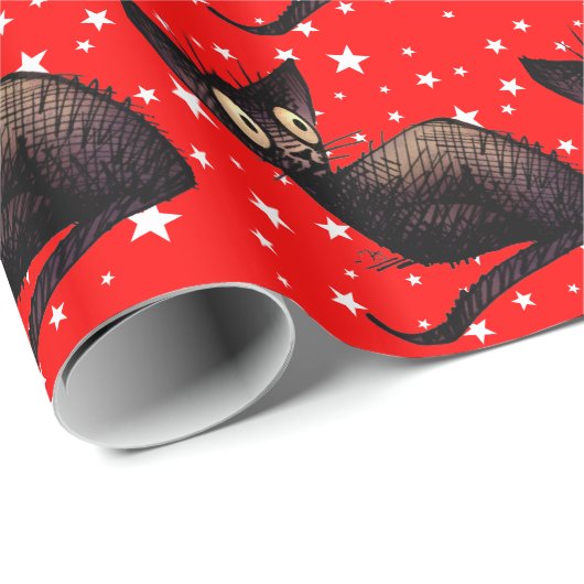 kerstkat op sterren cadeaupapier (Rol Hoek)