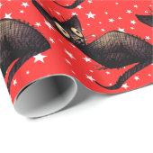 kerstkat op sterren cadeaupapier (Rol Hoek)
