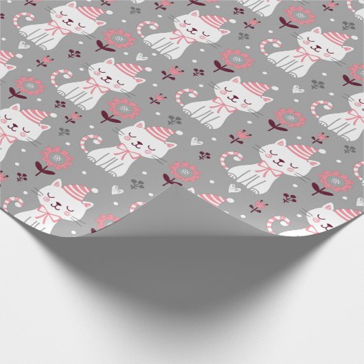 kerstkat — papierbladen cadeaupapier (Hoek)