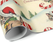 Kerstkatje rijdt op een zuurstok cadeaupapier (Rol Hoek)