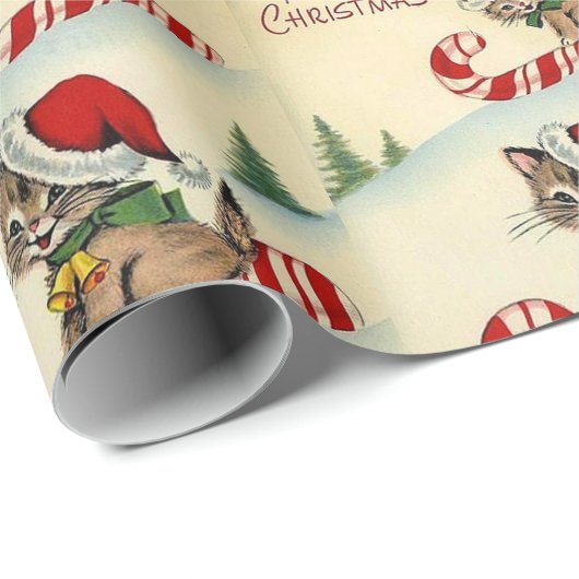 Kerstkatje rijdt op een zuurstok cadeaupapier (Rol Hoek)