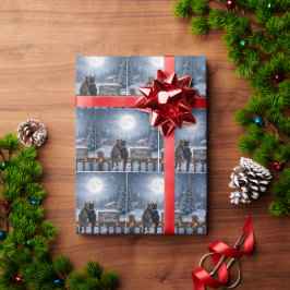 Kerstkatten knuffelen op een besneeuwde omheining cadeaupapier
