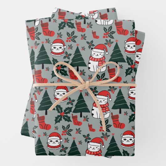 Kerstkatten met hulst plant inpakpapier vel (In situ)