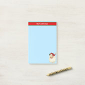 Kerstkerstkerstkerstkerstbedekking op lichtblauw post-it® notes (Op bureau)