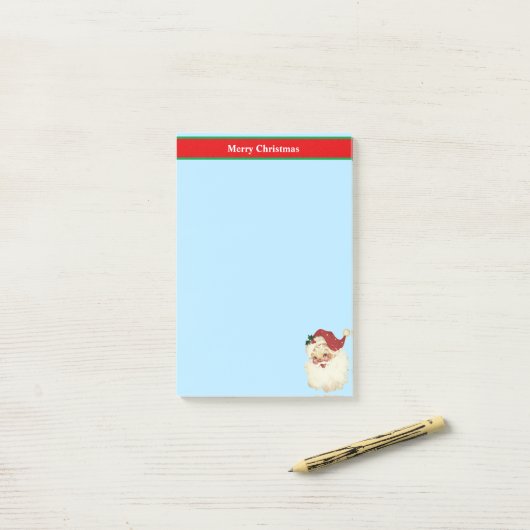 Kerstkerstkerstkerstkerstbedekking op lichtblauw post-it® notes (Op bureau)