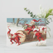 Kerstkerstkerstkerstkleppen die op een logboek gli feestdagenkaart (Staand voorkant)