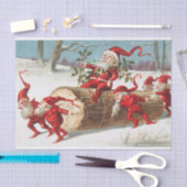 Kerstkerstkerstkerstkleppen die op een logboek gli tissuepapier (Craft)