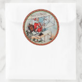 Kerstkerstman die een oud vliegtuig vliegt ronde sticker (Tas)