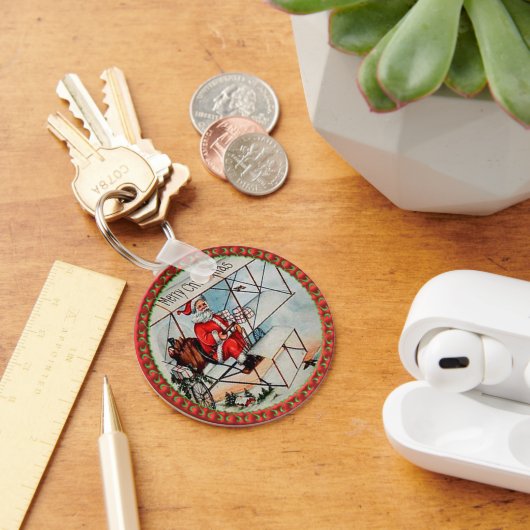 Kerstkerstman die een oud vliegtuig vliegt sleutelhanger (Bureau)