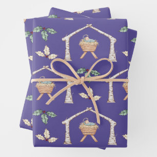 Kerstkindje in kribbe inpakpapier vel