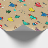 Kerstkippen lichten goud op cadeaupapier (Hoek)