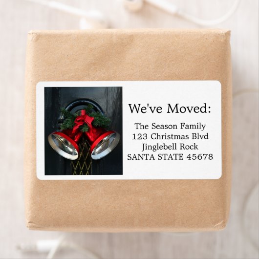 Kerstklokken op het etiket van de deur (Insitu)