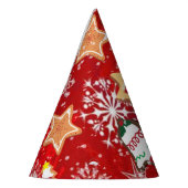 Kerstkoekjes en sneeuwvlokken op rood feesthoedjes (Links)