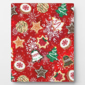Kerstkoekjes en sneeuwvlokken op rood fotoplaat (Voorkant)