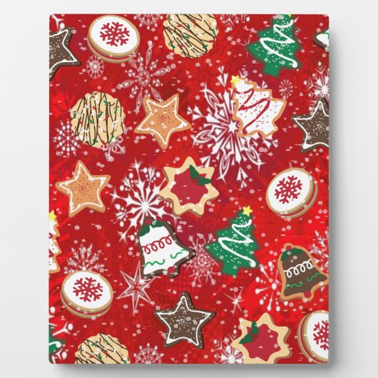 Kerstkoekjes en sneeuwvlokken op rood fotoplaat (Voorkant)