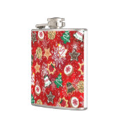 Kerstkoekjes en sneeuwvlokken op rood heupfles (Links)