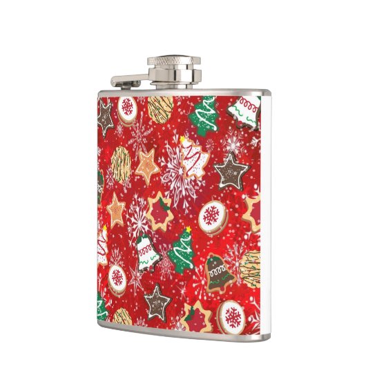 Kerstkoekjes en sneeuwvlokken op rood heupfles (Links)