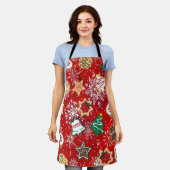 Kerstkoekjes en sneeuwvlokken op rood Schort (Gedragen)