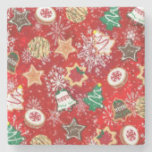 Kerstkoekjes en sneeuwvlokken op rood stenen onderzetter (Voorkant)