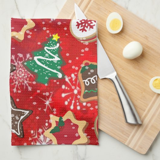 Kerstkoekjes en sneeuwvlokken op rood theedoek (Quarter Fold)