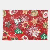 Kerstkoekjes en sneeuwvlokken op rood theedoek (Horizontaal)