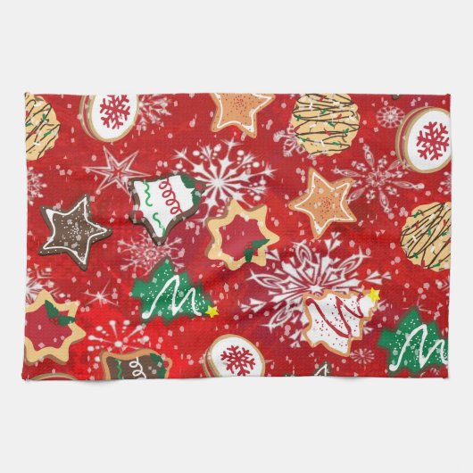 Kerstkoekjes en sneeuwvlokken op rood theedoek (Horizontaal)