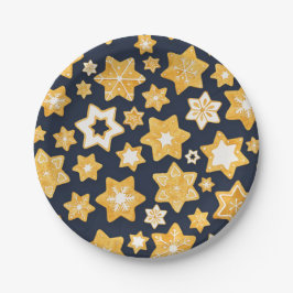 Kerstkoekjes met blauwe grijze achtergrond papieren bordje