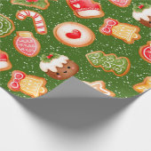 Kerstkoekjes met sneeuwachtergrond cadeaupapier (Hoek)
