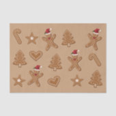 Kerstkoekvormen van gemberkoek op bruin tissuepapier (Voorkant)