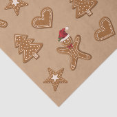 Kerstkoekvormen van gemberkoek op bruin tissuepapier (Detail)