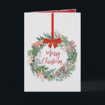 Kerstkrans gevouwen feestdagen kaart<br><div class="desc">Mooie krans van de winter botanicals bevatten Merry Christmas in het midden en uw gepersonaliseerde groet en bericht aan de binnenkant. MEER stijlen in ons collectie.</div>