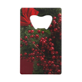 kerstkrans met rode bessen creditkaart flessenopener