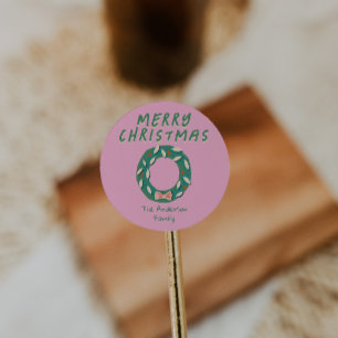 Kerstkrans met vintage handgeschilderde roze en gr ronde sticker