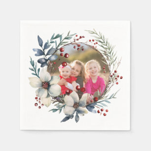 Kerstkrans, witte bloemen, rode bessen foto servet