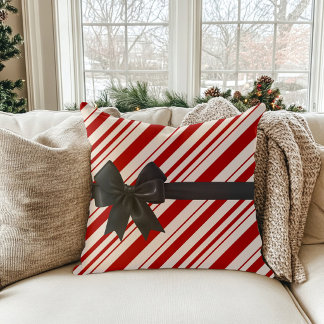 Kerstkussen met gestreepte suikerstok en strik kussen