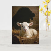 Kerstlam in een voederbak met leeuwenschaduw kaart (Gele Bloem)