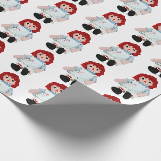 Kerstlap pop met snoepriet cadeaupapier (Hoek)