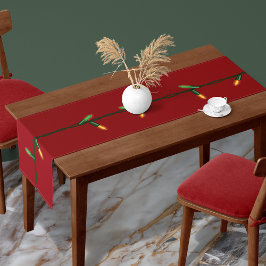 kerstlijnlampjes op rode tafelloper