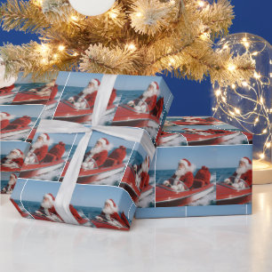 Kerstman die cadeaus bezorgt per speedboot cadeaupapier