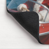 Kerstman die cadeaus bezorgt per speedboot muismat (Hoek)
