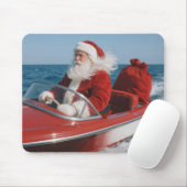 Kerstman die cadeaus bezorgt per speedboot muismat (Met muis)