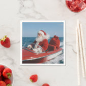 Kerstman die cadeaus bezorgt per speedboot servet (Insitu)