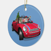 Kerstman die een mini rijdt keramisch ornament (Links)