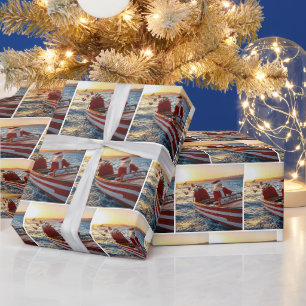 Kerstman die een speedboot bestuurt cadeaupapier