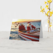 Kerstman die een speedboot bestuurt kaart (Gele Bloem)